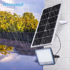 Waterproof LED solar flood light installed outdoors